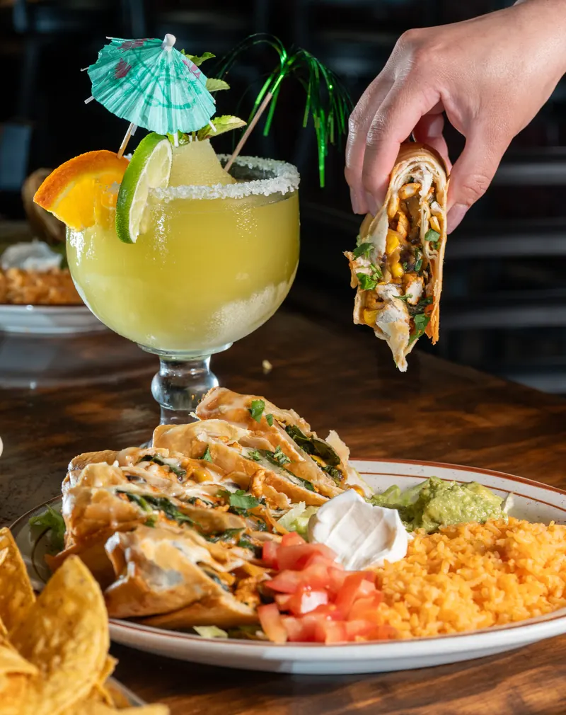 Rolled flour tortillas with rice and guacamole