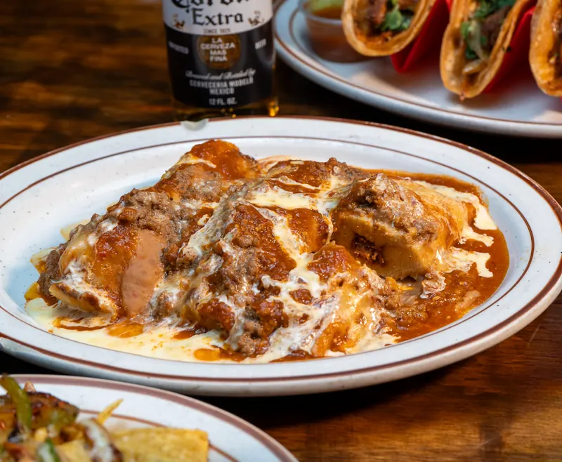 Tamales with red sauce and cream